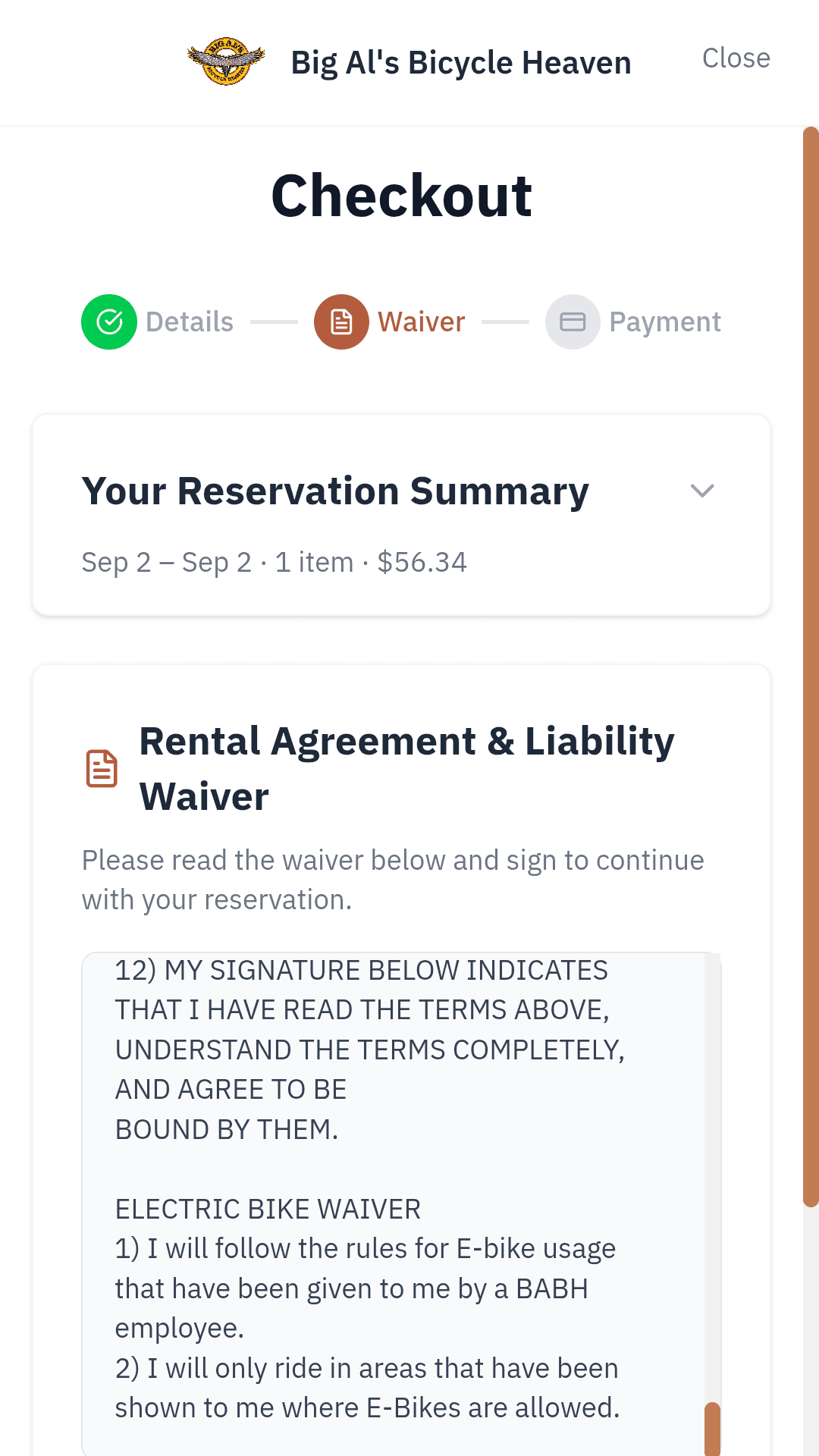 The rental agreement and liability waiver on a phone, part-way through checkout.